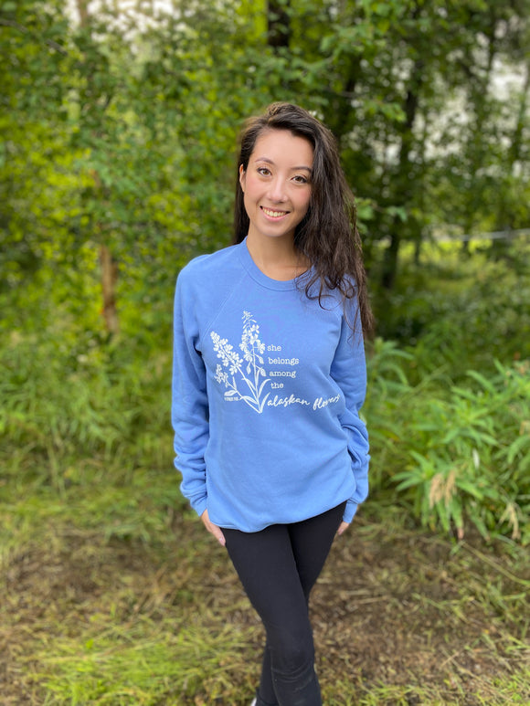 She Belongs Among the Alaskan Flowers Crew Sweatshirt- Lavender Blue